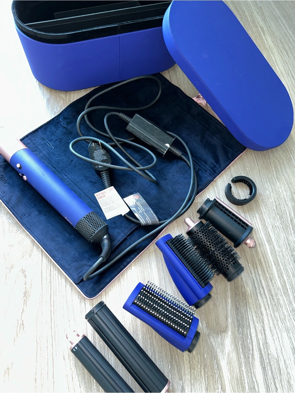 Dyson Men's Hair Styler in Blue and Rose Gold with Multiple Brush Attachments